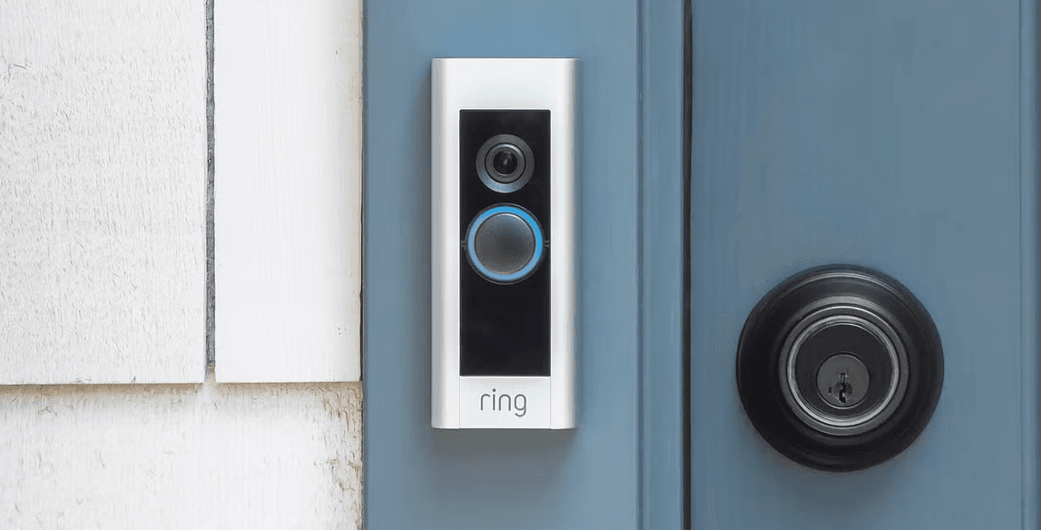 Ring video doorbell installed next to a front door